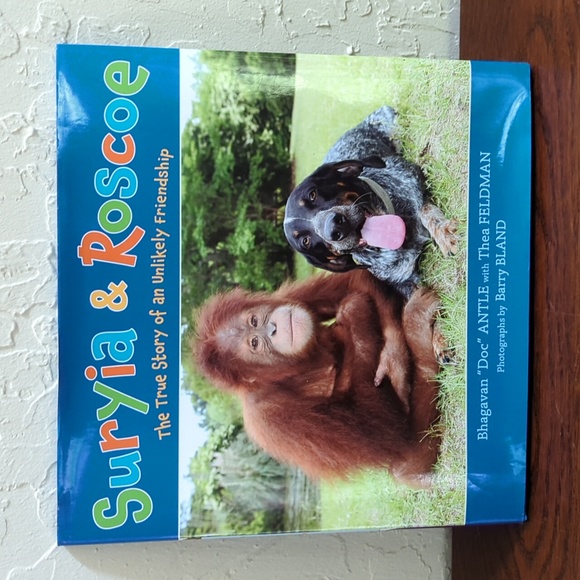 3/$20🌟 Suryia & Roscoe: The True Story of an Unlikely Friendship Hardcover Book - Picture 1 of 9